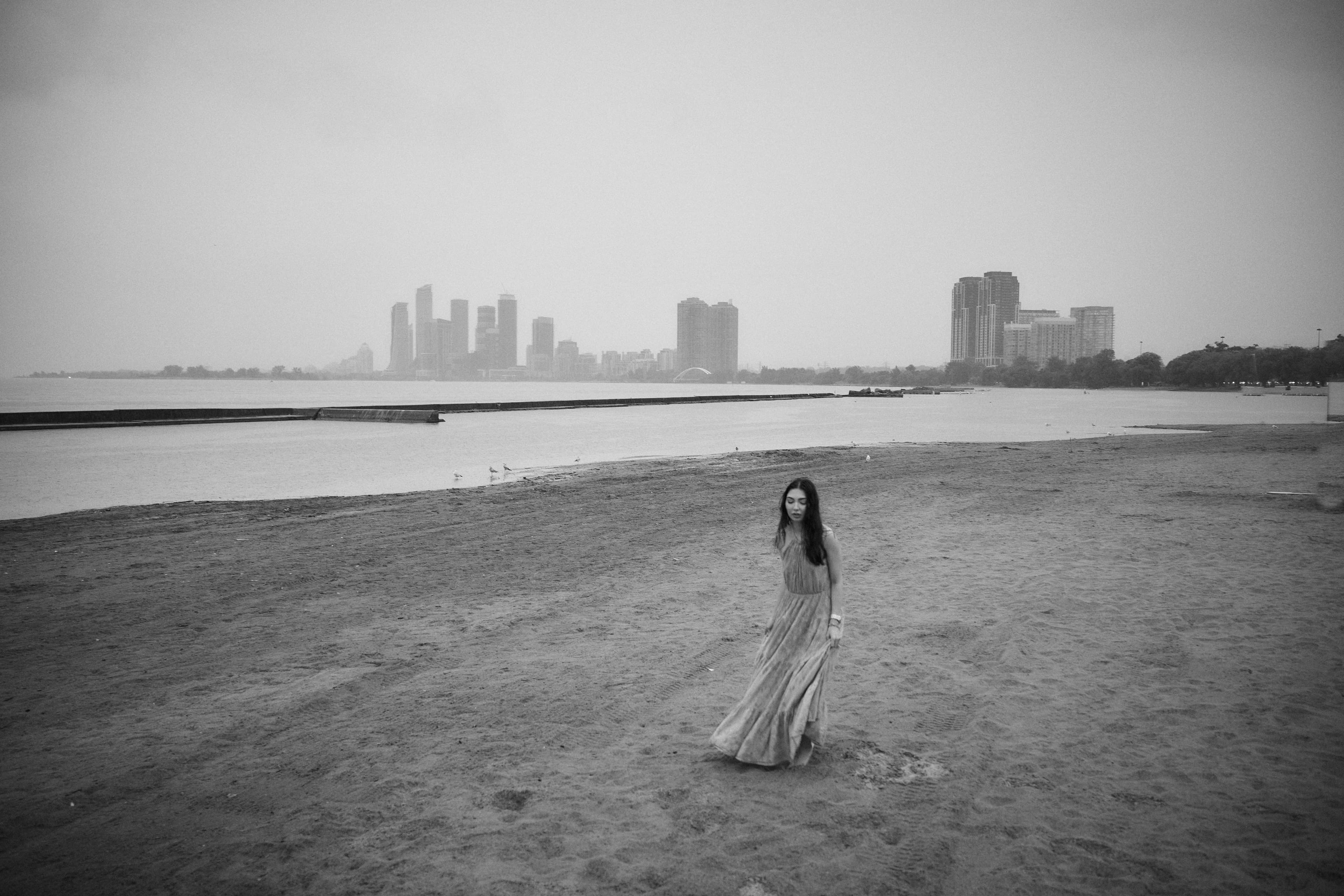 Wide beach portrait with Toronto in the distance